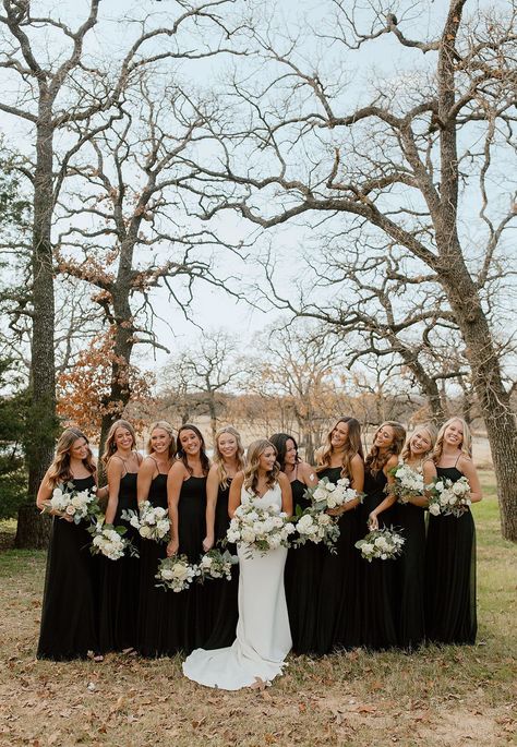 Christmas Wedding Black Bridesmaid Dresses, Black Bridesmaid Dresses Outdoor Wedding, Black Bridesmaid Wedding Party, Black Bridesmaid Dresses With Greenery, Black Bridesmaids Dresses Fall, All Black Dress Bridal Party, Black Bridal Party Color Schemes, Flowers With Black Bridesmaid Dresses, Black Different Bridesmaid Dresses