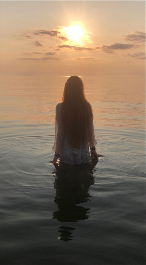 Wading Through Water, Metamorphosis Photoshoot, Person Standing In Water, Singles Poses, Hopeful Painting, Drowned Aesthetic, Woman Standing In Water, Washed Up On Shore, Standing In Water