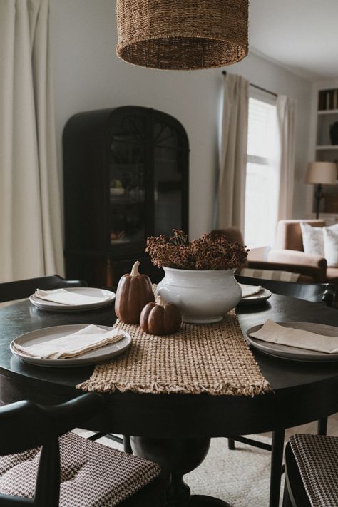 Black Round Table Dining Room, Every Day Dining Room Table Decor, Moody Dining Room Round Table, Dining Room With Black Round Table, How To Style Round Table, Black Round Dining Room Table Decor, Black Round Table And Chairs, Circle Dining Table Decor Centerpiece, Black Circle Table Dining Rooms