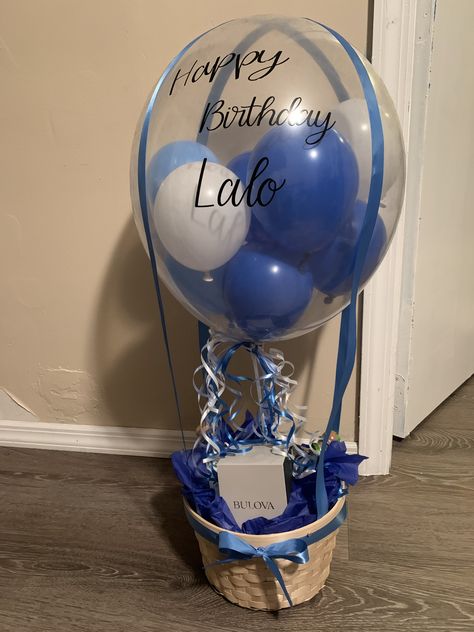 Hot air balloon gift basket for men Hot Air Balloon Gift Basket Birthday, Bobo Balloon Ideas For Men, Bobo Balloon Gift Basket, Gift Basket With Balloons, Birthday Balloon Ideas For Him, Balloon Bouquet For Men, Hot Air Balloon Gift Basket, Birthday Balloons For Men, Balloon Gift Basket