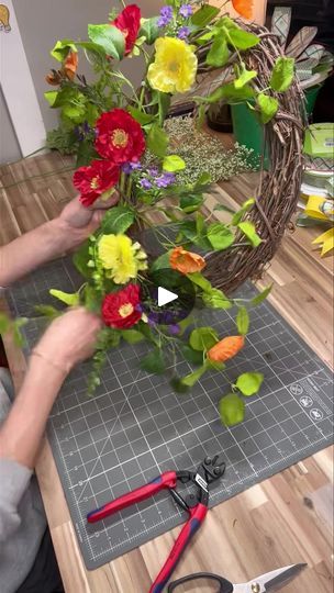 📣Sound on📣

Let’s create a bright grapevine wreath in under 10 minutes! | By How I See It Blog, LLC | Hey everyone. It's Cody here
with How I See It where I inspire you every day to see
the world how I see it. Let's make a oval grapevine wreath
using minimal supplies and a pretty bow. So I'm going to be
going in with a 14 inch grapevine wreath today. And I'm
going to be using some poppy sprays. And I'm going to be
using two of these bushes. You can find links to all of my
favorite suppliers at Cody's Links. com. Cody's Links. com.
This is a poppy spray and I have two of these and I'm
going to start by fluffing these up bringing some life to em.
Whenever you get florals in or you buy em from the store or
you order them online, usually all smooshed down from being
the packaging. So, we wan Oval Grapevine Wreath, Happy Spring, I See It, See The World, Beautiful Wreath, Spring Wreath, Homemade Cards, Pretty Good, Grapevine Wreath