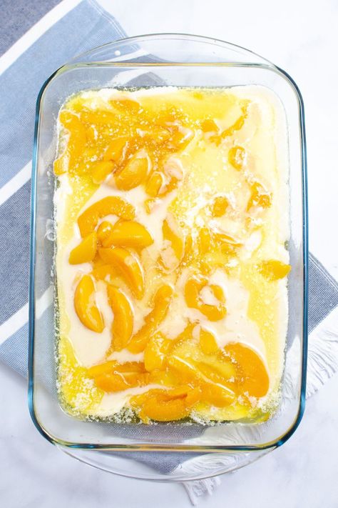 Peach Cobbler With Canned Peaches is an easy peach cobbler recipe that uses 5 ingredients. A quick dessert that is made from scratch and uses self rising flour, milk, butter and more. Don't wait and try this canned peaches cobbler today. A great throw together dessert for unexpected guests, potlucks, tailgating, and more. 4 Ingredient Peach Cobbler, Peach Cobbler With Self Rising Flour, Canned Peach Cobbler Recipe Cake Mixes, Cup Cup Cup Peach Cobbler, Juicy Peach Cobbler, 1 Cup Cobbler Recipe, Old Time Peach Cobbler, Make Ahead Peach Cobbler, 1 Cup Peach Cobbler Recipe