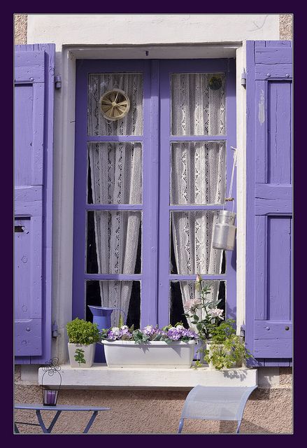 Gorgeous periwinkle window frame and shutters in Provence.  Note the table and chair outside that has the same color. Purple Shutters, An Open Window, Lavender Cottage, Purple Door, Lavender Aesthetic, Fashion School, Purple Home, Beautiful Windows, Old Windows