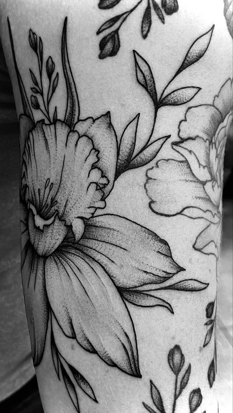 Daffodil tattoo, black and grey whip shading tattoo, floral tattoo IG*@theluna__* Whipped Shading Tattoo, Daffodil Tattoo Shaded, Daffodil Chest Tattoo, Black And Grey Daffodil Tattoo, Black Daffodil Tattoo, Black And White Daffodil Tattoo, Daffodil Tattoo Black And White, Grey Shading Tattoo, Daffodil Tattoo Sleeve