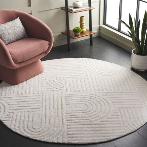 Elevate your living space with the timeless elegance of our 6' X 6' Round Beige Area Rug. Meticulously crafted in India, this rug boasts a transitional style that seamlessly blends classic charm with modern sensibilities, making it a versatile addition to any decor. Constructed using a state-of-the-art power loom technique, this round rug ensures precision in every stitch, resulting in a product with exceptional durability and longevity. The careful blend of 80% micro polyester and 20% cotton delivers a soft, plush feel underfoot while maintaining the strength needed for everyday life. Standing at a comfortable 3/8" in height, the rug's low profile makes for easy placement in busy areas, facilitating movement and furniture placement without compromising on comfort. The rug pattern, observe Mid Century Modern Rug, Circular Rugs, Rug Shape, Rugs Usa, Diy Rug, Unique Loom, Shag Area Rug, Round Area Rugs, Rug Shapes