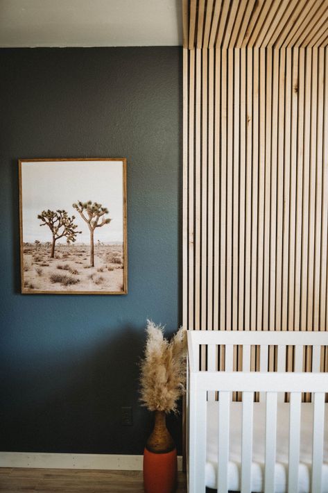 Blue Nursery Ideas Gender Neutral, Gender Neutral Nursery Panelling, Wall Paneling In Nursery, Nursery Wood Slat Wall, Nursery Slat Wall, Wood Panel Accent Wall Nursery, Wood Slat Accent Wall Nursery, Nursery Ideas Mid Century Modern, Boys Boho Nursery