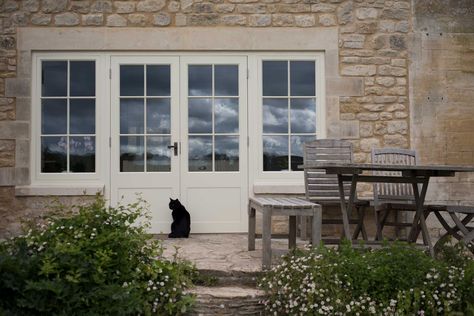 Patio doors: 10 designs for period homes | Real Homes Wooden Casement Windows, Cottage Patio, Country Doors, Oak Framed Buildings, Cotswolds Cottage, Custom Wood Doors, French Doors Exterior, Cottage Renovation, Timber Windows