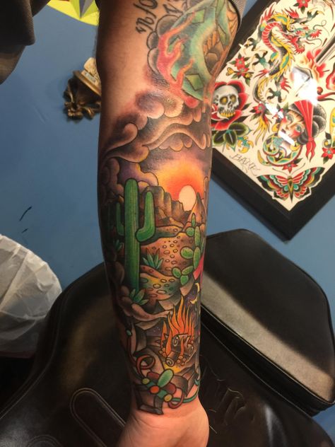 Arrow head in the desert. Done by Jason Bane at Iron Age tattoos St. Louis MO. Southwest Sleeve Tattoo, Desert Tattoo Color, New Mexico Sleeve Tattoo, Desert Shoulder Tattoo, Desert Theme Sleeve Tattoo, Desert Flower Tattoo Sleeve, Desert Leg Sleeve Tattoo, Sonoran Desert Tattoo, American Traditional Desert Tattoo