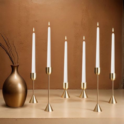 PRICES MAY VARY. 🕯️ [Timeless Elegance] - Illuminate your space with timeless elegance using our set of 6 Modern Gold Candle Stick Holders. Each holder is meticulously crafted to exude sophistication and charm, making every candle-lit moment a luxurious experience. 🌟 [Sleek Modern Design] - Designed with a sleek and slender silhouette, these candle stick holders add a modern touch to any room. The gold finish enhances their allure, making them a statement piece in your home decor. 🔥 [Secure C Candle Sticks Dining Room Table, Taper Candles Wedding Centerpieces, Candle Stick Centerpiece, Gold Candle Stick Holders, Wedding Dinners, Taper Candles Wedding, Candlestick Centerpiece, Elegant Candle Holders, Candle Wedding Centerpieces