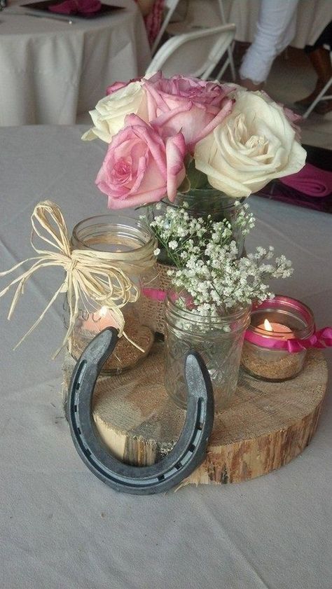 Rustic wedding shower center pieces using all different sizes mason jars / http://www.deerpearlflowers.com/rustic-farm-wedding-horseshoe-ideas/ Rustic Wedding Showers, Wedding Horseshoes, Hipster Wedding, Rustic Farm Wedding, Cowgirl Birthday Party, Horse Party, Rustic Mason Jars, Western Parties, Cowgirl Birthday