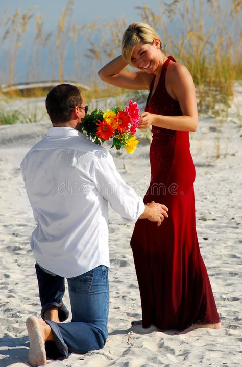 Man offering woman flowers. Man down on one knee offering bouquet to woman #Sponsored , #sponsored, #sponsored, #offering, #bouquet, #knee, #Man Love Spell Caster, Getting Him Back, Love Spells, Love Images, Best Love, Gown Wedding Dress, Got Him, Bridal Collection, Red Formal Dress