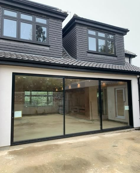 Loving these newly installed aluminium sliding doors we installed for a home in London.⁠🖤⁠
⁠
Having recently undergone a rear extension, our client came to us wanting three panel sliding doors with ultra slim black aluminium frames. ⁠
⁠
The contemporary design of the home pairs beautifully with our doors, they add a modern touch and sophistication to the property. Black Aluminium Sliding Doors, Aluminium Doors Design Modern, French Sliding Doors Exterior, Sliding Back Door, Panel Sliding Doors, Aluminium Door Design, Sliding Glass Windows, Sliding Doors Exterior, Doors Room