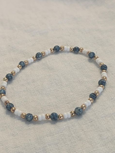 Beautiful teal, white and gold bracelet. Durable finish with a delicate look. Bracelets Of Beads, Pretty Bead Bracelets, Beaded Gold Bracelet, Bracelet Beaded Ideas, Beaded Bracelets Ideas Words, Trending Bracelets 2024, Cute Simple Bracelets, Bracelet Inspo Beads, Homemade Beaded Bracelets