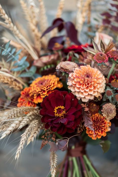 Bouquets for fall weddings capture the season's essence through their lush, warm colors and rustic appeal. These floral creations add a romantic, earthy vibe, enhancing the enchanting atmosphere of any autumn celebration. Vintage Fall Wedding Bouquet, Fall Natural Wedding, Fall Wedding Colors October Floral Arrangements, Pussywillow Bouquet Wedding, Fall Peonies Bouquet, Fall Colored Bouquets, Fall Floral Swag, Types Of Wedding Flowers Fall, Rustic Wedding Bouquet Fall Color Schemes