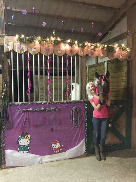 My horse's Christmas stall for 2014. Year three for our Christmas stall decorating contest. This year I went a little non-traditional and did a Hello Kitty theme for my horse! Apache played along well and even let me put pink hair extensions in his forelock. Christmas Horse Stall Decorating Ideas, Horse Stall Decorations For Fair, Stall Decoration Ideas Fair, County Fair Decorations, Horse Stall Decorations, 4h Fair, Pen Decoration, Horses Christmas, Fair Season