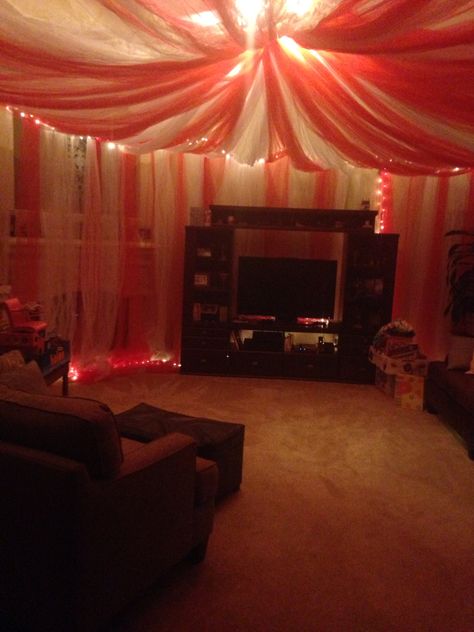 Living room circus tent- 12 bolts of white, 12 bolts of red. Clown Living Room, Circus Living Room, Tent Living Room, Carnival Home Decor, Clown Interior Design, Circus Tent Interior, Clown Themed Room, Circus Room Aesthetic, Clown Room Aesthetic