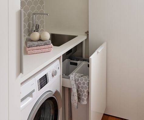 A small space renovation gave this family of five a stylish cupboard laundry that met all their needs in terms of storage, bench space and functionality. Laundry Basket Cupboard, Laundry Basket Under Sink, Laundry Hamper Ideas Small Space, Small Bathroom With Laundry, Cupboard Laundry, Washing Basket Storage, Under Sink Cupboard, Bathroom With Laundry, Apartment Laundry