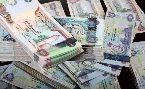 Flush with cash, UAE banks offer more loans .. http://www.emirates247.com/business/economy-finance/flush-with-cash-uae-banks-offer-more-loans-2015-05-26-1.591852 Uae Money, Central Bank, Interest Rates, Money