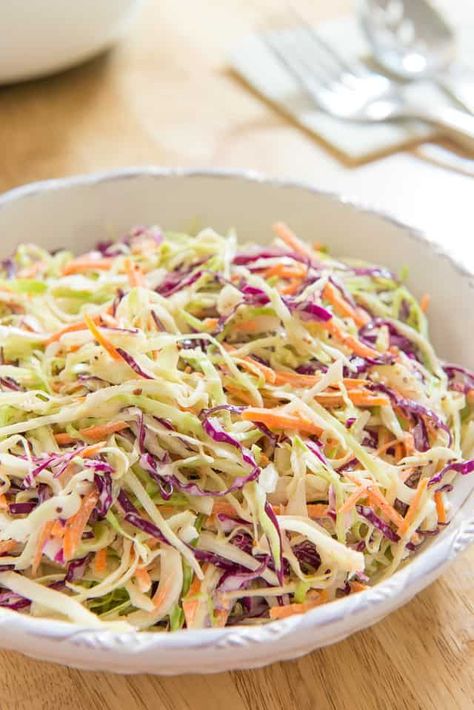 This Coleslaw recipe is crisp and refreshing, with just enough creamy dressing to bring it all together. #coleslaw #healthy #sidedish #cabbage via @fifteenspatulas Classic Coleslaw Recipe, Southern Coleslaw, Coleslaw Dressing Recipe, Best Coleslaw Recipe, Salad Appetizer Cups, Healthy Coleslaw, Easy Coleslaw, Coleslaw Recipe Easy, Slaw Dressing