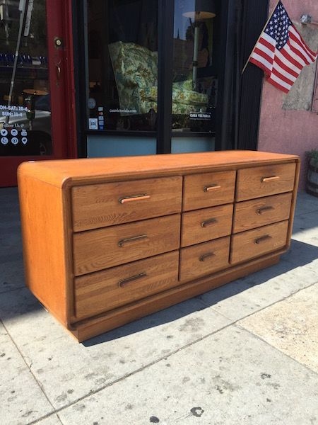 Imminent Impression | 1980s Oak Dresser with 9 Drawers — Casa ... Retro Bedroom Furniture, 80s Furniture, Dresser Flips, Los Angeles Sunset, Retro Dresser, Retro Apartment, Brown Dresser, Low Dresser, Dresser With Tv