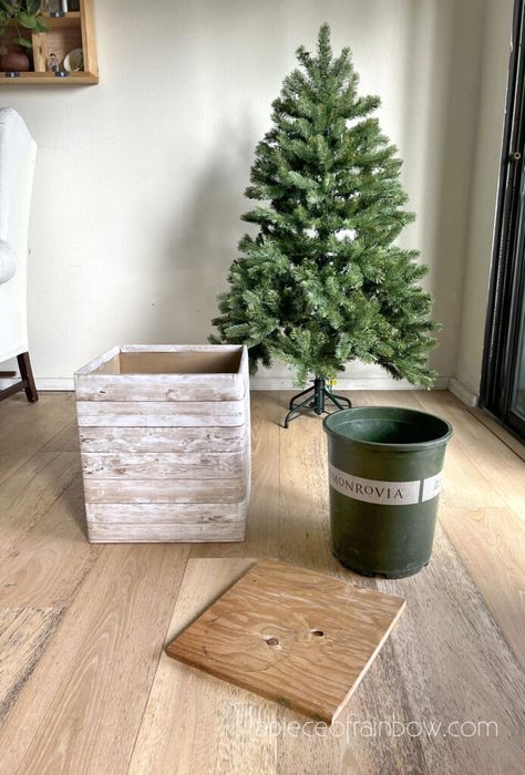 Diy Christmas Tree Base Ideas, Christmas Platform Ideas, Elevated Tree Stand, Christmas Tree Rack, Christmas Tree In Wooden Crate, Diy Box For Christmas Tree Stand, How To Make A Christmas Tree Box Stand, Table Top Christmas Trees Ideas, Christmas Tree Raised Base