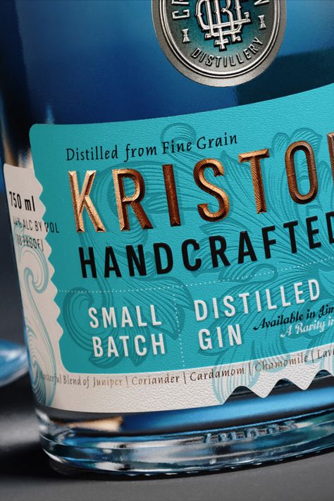 Lovingly decorated with gold and silver details, Crystal Rain Distillery's Kristone Craft Gin has all the shine of a mint. The Labelmaker made a liquor to show off with their beautifully textured design for the gin brand, accented with timeless floral details and an intricate monogram on the lid and bottle. Gin Label Design Branding, Tequila Packaging Design, Whisky Label Design, Gin Bottle Design, Liquor Design, Gin Branding, Gin Label, Gin Packaging, Vodka Packaging