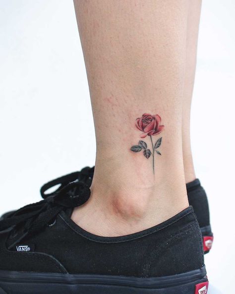 Little red rose tattoo inked on the left ankle Minimalist Rose Tattoo, Sunflowers Tattoo, Rose Tattoo On Ankle, Ankle Tattoo Men, Colour Tattoo For Women, Minimalist Rose, Ankle Tattoo Designs, Rose Tattoos For Women, Small Rose Tattoo