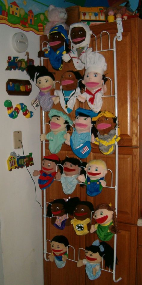 over the door shoe caddy? i might even be able to find that at the thrift store!! Puppet Display Puppet Storage, Puppet Display, Door Shoe Rack, School Theater, Play Therapy Room, Custom Puppets, Puppets For Kids, Puppets Diy, Toy Theatre