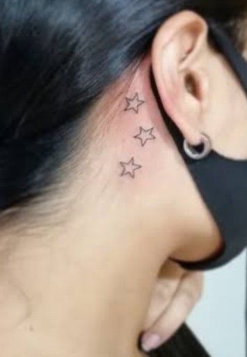 Star Tattoos For Women On Neck, Name On Ear Tattoo, Easy Behind The Ear Tattoo, Neck Star Tattoos Women, Star Neck Tattoos For Women, Star On Neck Tattoo, Behind The Ear Star Tattoo Ideas, Behind The Ear Tattoo Ideas Stars, Behind The Ear Star Tattoo