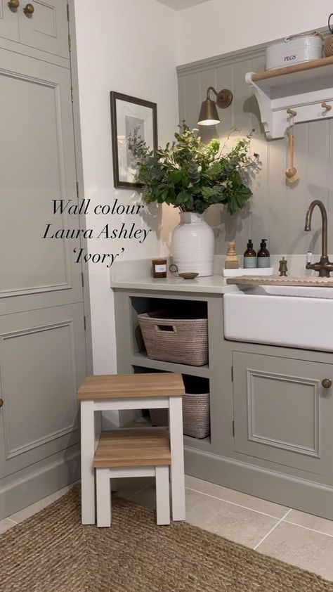 Morning 👋🏻Another room, I’m frequently asked, which paint colours we’ve used in this utility/boot room. Walls @lauraashleyuk ‘Ivory’ Panelling & Cabinetry @farrowandball ‘Hardwick White Hardware & wall lights @jimlawrencemade Faux stems @neptunehomeofficial Rug @thewhitecompany Have a lovely Wednesday ☀️xx #interiordecor #homedecorideas #colour #homestyling #homedecoration #neutralstyle #neutralshades #decorideas #explore #rusticinteriordecor #neutrals #paint #panelling #farrowandball #nept Utility Colour Schemes, Utility Room Wall Lights, Utility Decor Ideas, Panelling Utility Room, Green Utility Room Ideas, Utility Room Panelling, Neutral Utility Room, Olive Green Utility Room, Neptune Utility Room