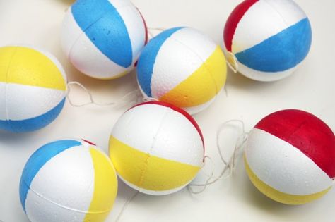 DIY Beach Ball Garlands for Summer Pool Parties: DIY Beach Ball Garland for Summer Pool Parties Beach Ball Garland, Indoor Beach Party, Styrofoam Ball Crafts, Backyard Pool Party, Summer Party Diy, Beach Centerpieces, Backyard Pool Parties, Library Crafts, Diy Girlande