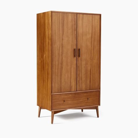 Our Mid-Century Armoire is an instant closet and versatile storage system all in one. Anticipating your every storage need, it comes with two removable hanging rods, four adjustable shelves, a deep drawer, three hooks and a full-length mirror. #dwellshop #modernbedrooms #wardrobedesigns #wardrobe #armoire West Elm Mid Century, Mid Century Daybeds, Mid Century Bed, 60s Furniture, Modern Dresser, Room Planning, Dressers And Chests, Small Furniture, Apartment Ideas