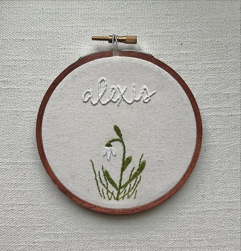 Birth flower name hoops are now available! They are completely customizable and so darling! This name hoop is perfect for any nursery wall, name announcement, baby keepsake and so much more! Did you know what your birth flower is? I only recently found out! #handmade #handembroidered #birthflower #embroidered #handembroideredgifts #embroideryhoopart #embroideryhoopdecor #nurserydecor #nurserydesign #babyshower #babyshowergift #babyannouncement #nameannouncement #genderreveal #babygirl #ba... Hand Embroidered Gifts, Embroidery Hoop Decor, Name Announcement, Flower Names, Baby Keepsake, Embroidery Hoop Art, Birth Flower, Nursery Design, Birth Flowers