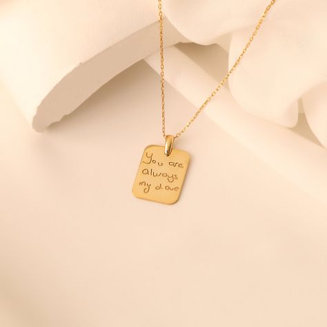 Discover the All Uniqueness Custom Handwriting Necklace, a cherished keepsake that captures your personal touch. This exquisite piece transforms your handwriting or a loved one's drawings into a timeless memory. Crafted from high-quality 925 Sterling Silver, available in Gold or Rose Gold plating, this necklace is a perfect gift for any occasion. For optimal results, use dark pencil on white paper; longer texts may appear smaller. Share your heartfelt messages with someone special; we accommodat Gold Engraved Necklace, Handwriting Necklace Custom, Jewelry Couple, Mythology Jewelry, Personalized Wedding Rings, Handwriting Necklace, Puzzle Jewelry, Couple Necklace, Engraved Wedding Rings