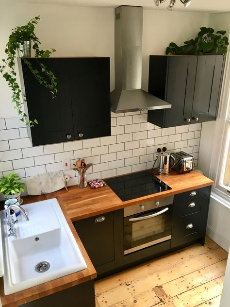 Black Kitchen On A Budget, Tiny Black Kitchen Ideas, Black And Wood Small Kitchen, Apartment Kitchen Reno, Tiny Kitchen Black Cabinets, Kitchen Small Black, Black Tiny Kitchen, Black Cabinet Small Kitchen, Tiny Kitchen Minimalist