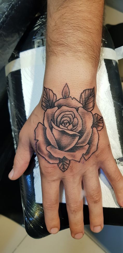 Simple Tattoo Designs Men Arm, Hand Flower Tattoo Men, Japanese Hand Tattoos For Men, Flower Hand Tattoo Men, Rose Hand Tattoo Men, Rose On Hand Tattoo, Hand Tattoos For Guys Men, Side Hand Tattoos For Guys, Hand Tattoos Rose