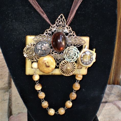 Amazing Piece Of Statement Jewelry, Pendant Which I Designed Using All Vintage And Antique Findings. Included Are: Reflector Button (1920's), Metal Buttons, Buckle (As The Base), Beautiful Stone Beads Dangling From Bottom And At The Top Is An Antique Filigree Pin Which Features An Amber Stone. A Non Working Watch Further Embellishes This Pendant. I Designed This As A Pendant And Have Included A Handmade Multiple Strand Silk Ribbon/Cord Necklace.You Can Of Course Hang It From A Choker R Necklace Vintage Key Jewelry, Broken China Jewelry Diy, Upcycling Jewelry, R Necklace, Belt Buckle Jewelry, Jewelry Collage, Tie Scarves, Jewelry Keychain, Altered Art Jewelry