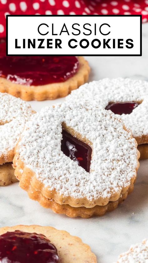 Traditional Linzer Cookies are rich, buttery cookies beautifully accentuated by almonds, fruit preserves, and cinnamon. Cut out in all sorts of fun shapes and filled with your choice of jam filling, Linzer cookies deserve a starring role on your Christmas cookie platter! Linzer Tart Cookies, Raspberry Linzer Cookies, Nutella Chocolate Chip Cookies, Linzer Cookies Recipe, Easy Christmas Cookie Recipes, Linzer Cookies, Blueberry Breakfast, Pecan Cookies, Christmas Cookies Easy