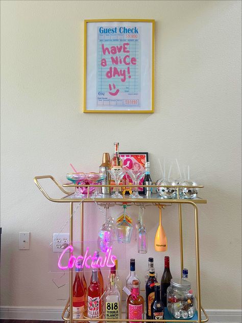 Retro Bar Cart Decor, Bar Cart With Neon Sign, Bright Bar Cart, Bar Cart For Apartment, Pink And Gold Bar Cart, Collage House Ideas, Gen Z Kitchen Decor, Good Bar Cart, Apartment Decorating With Color