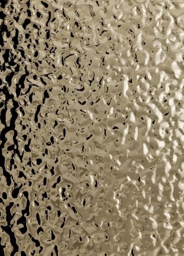 In this image, the gold foil has raised bumps and ridges that show texture. Inox Texture, Water Ripple Sheet, Mirror Texture, Stainless Steel Texture, Mirror Ceiling, Texture Metal, Ceiling Texture, Stainless Steel Sheet, Verre Design