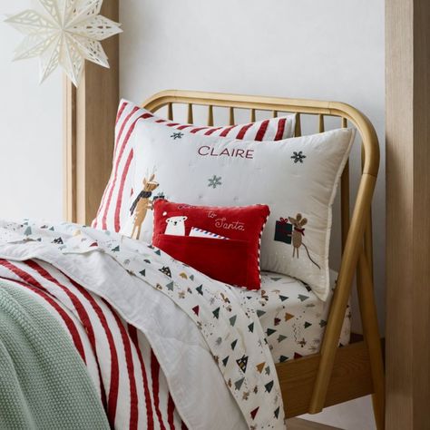 Our Holiday Presents Christmas Pillow Sham captures the spirit of the season, with a pair of woodland animals bearing gifts against a snowy white backdrop. Intricate hand-embroidered details give it a timeless, heirloom-quality feel, and it's made of extra-soft and lightweight organic cotton voile.   • 100% organic cotton shell and fill, grown without chemicals or pesticides  • Hand-embroidered and hand-quilted  • Envelope closure  • Shams sold individually  • This item can be embroidered with a Holiday Bed Sheets, Candy Cane Bedroom Decor, Kids Room Christmas Decorations, Christmas Master Bed, Kids Christmas Room Decor, Toddler Christmas Decor, White Christmas Decor Bedroom, Christmas Bedding Kids, White Christmas Bedroom Decor