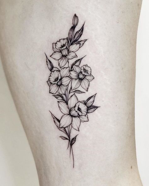 101 Amazing Daffodil Tattoo Designs You Need To See! | Outsons | Men's Fashion Tips And Style Guide For 2020 Mens Daffodil Tattoo, Daffodil Half Sleeve Tattoo, Daffodil Floral Tattoo, Daffodil Compass Tattoo, Daffodil Tattoo Arm Half Sleeves, Daffodil Sketch Tattoo, Bumble Bee And Daffodil Tattoo, Outline Floral Tattoo, Daffodil Tattoo Birth Flower