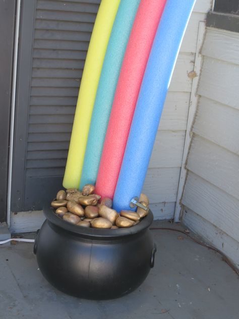 this rainbow and pot of gold easy to make! pool noodles with a long blot and nut to hold it together, paint rocks gold, fill pot with paper or Styrofoam add a cardboard top to place gold rocks on and done! Fancy Candle Holders, Sant Patrick, Door Decorating Ideas, St Patricks Decorations, Pool Noodle Crafts, St Patricks Day Decor, St Patricks Crafts, San Patrick, Door Decorating