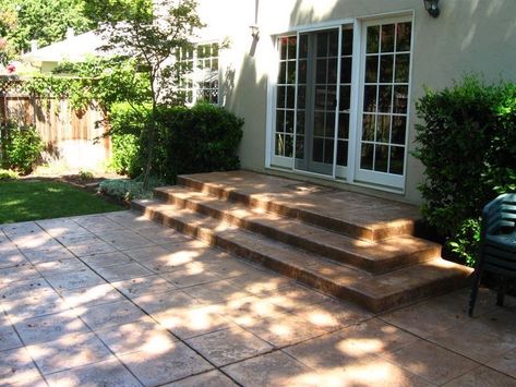 Concrete Raised Patio, Raised Patio Ideas, Cement Stairs, Poured Concrete Patio, Concrete Patio Ideas, Diy Concrete Patio, Jamie White, Patio Stairs, Small Outdoor Patios