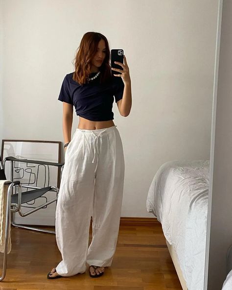 8 Summer Trouser Outfits That Are Easy, Stylish and Cool | Who What Wear Summer Trousers Outfits, Trousers Outfit Summer, Linen Trousers Outfit, White Linen Trousers, Linen Pants Outfit, Summer Wardrobe Staples, Summer Trousers, Trouser Outfit, Trouser Outfits