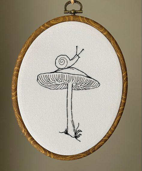 #handembroidery #embroidery #originalart #fibreart #snailembroidery #mushrooms #snails #stitchart #handstitched Snail Mushroom Embroidery, Snail Embroidery Simple, Snail Embroidery Pattern, Mushroom Embroidery Pattern Simple, Modern Embroidery Ideas Free Pattern, Mushroom Embroidery Pattern, Embroidery Mushrooms, Snail Embroidery, Frog On Mushroom