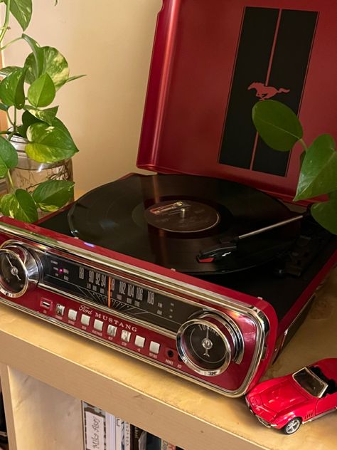 Vintage Ford Mustang 
Record player
Thrift store 
Vintage 
Dark red Filmy Vintage, Vinyl Record Player, Deco Originale, Room Deco, Apartment Decor Inspiration, Dream Room Inspiration, Dream Apartment, Built In Speakers, Cute Room Decor