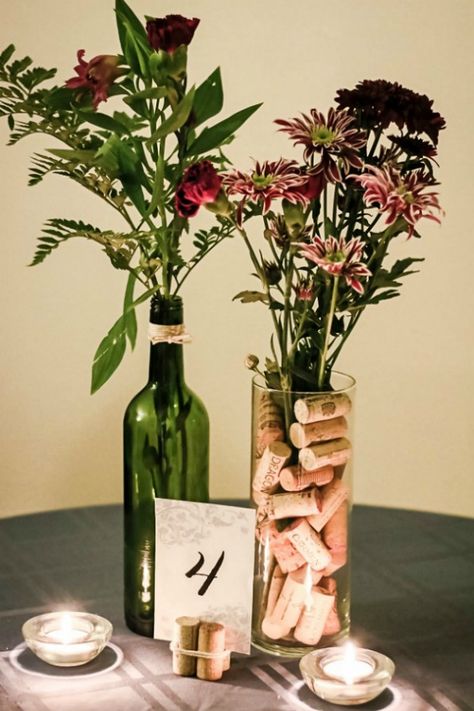 10 Creative Bottle Wedding Center Pieces That Are Absolutely Stunning Wine Themed Wedding Centerpieces, Wine Bottle Wedding Centerpieces, Cheap Centerpieces, Beautiful Wedding Centerpiece, Wine Bottle Centerpieces, Wedding Wine Bottles, Deco Champetre, Bottle Centerpieces, Unique Wedding Flowers