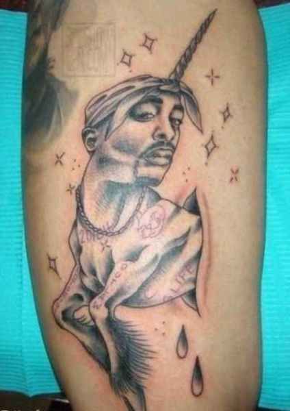 The 34 Most Inexplicable And Weird Tattoos Of Celebrities Tupac Tattoo, Dumbest Tattoos, Really Bad Tattoos, Horrible Tattoos, Unicorn Tattoo, Best Tattoo Ever, Fan Tattoo, Unicorn Tattoos, Tattoo Fails