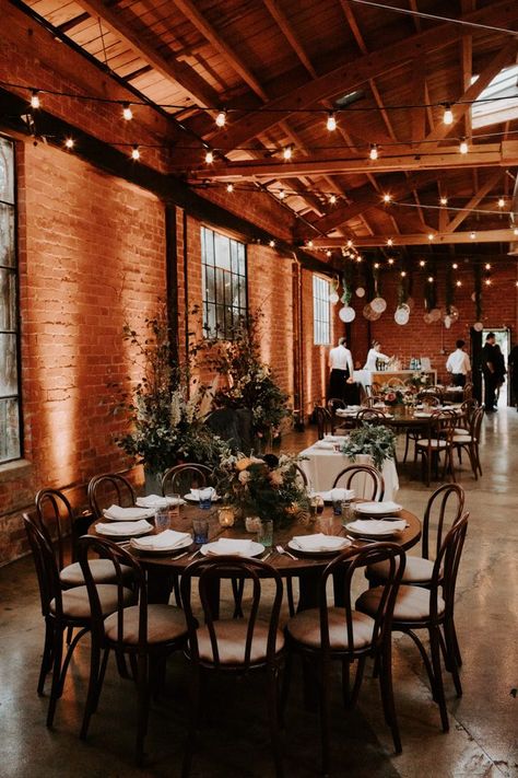 Rustic Industrial Seventh Place Wedding in Los Angeles | Junebug Weddings Rustic Industrial Decor Wedding, Old Building Wedding Reception, Rustic Industrial Wedding Centerpieces, Industrial Christmas Wedding, Industrial Elegant Wedding, Exposed Red Brick, Urban Wedding Decor, Rustic Industrial Wedding, Floral Wedding Centerpieces